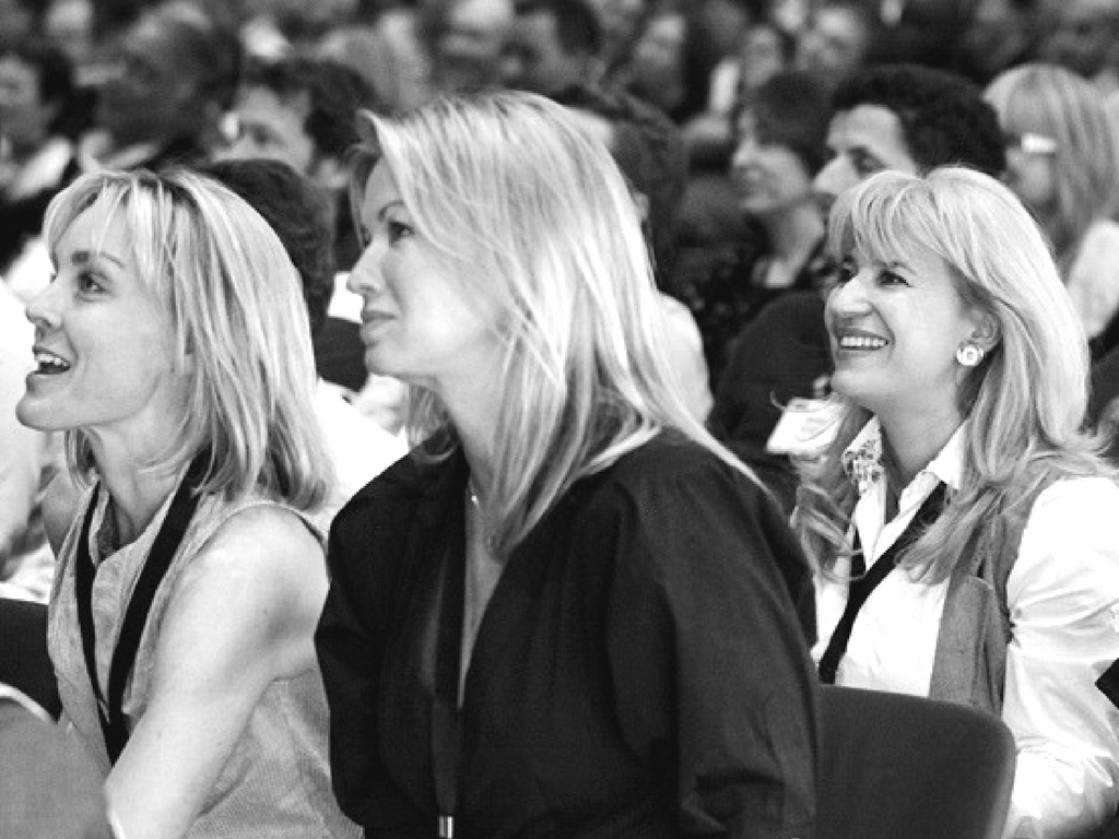 Excited happiness is usually expressed by smile with the head tilted upwards